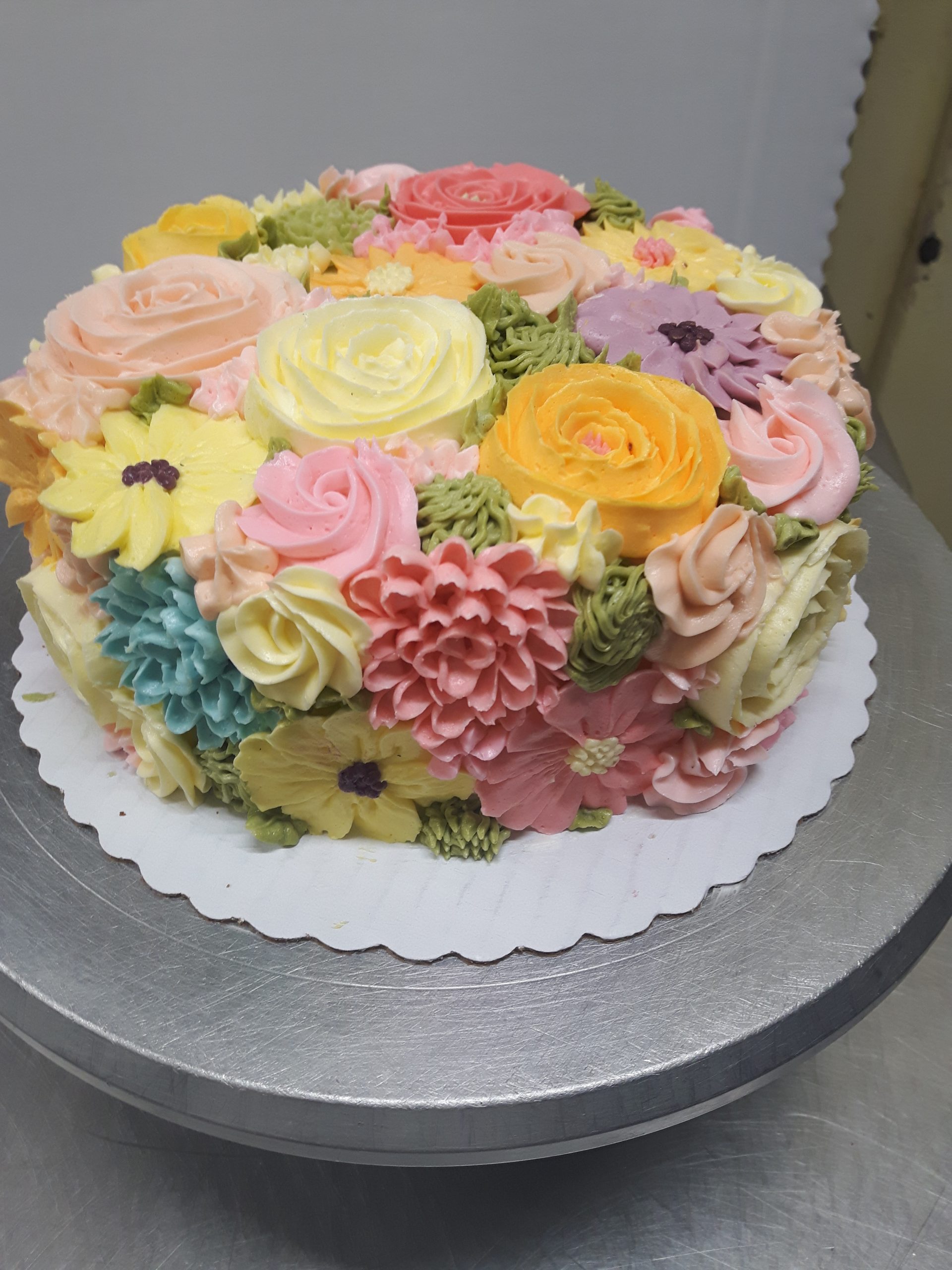 round birthday cakes with flowers